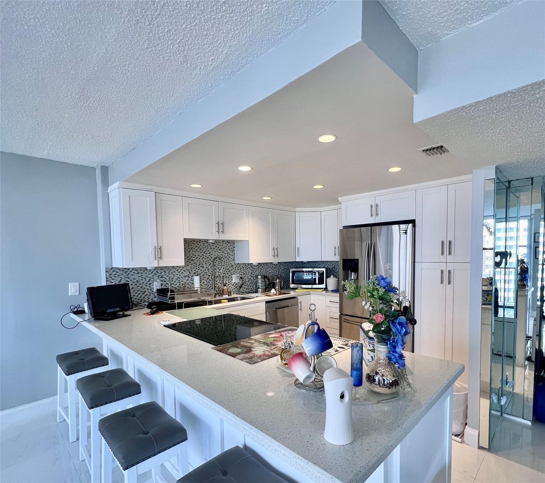 Huge oversized 2 bedroom with a gigantic master bedroom + Walk in closet to match! Completely renovated with a Prime location right across the street from the beach—20 min to Fort Lauderdale Airport, 10 min to Aventura Mall, Big Easy Casino, Gulfstream Park & Hollywood Broadwalk, 15 min to Dania Pointe & Dania Casino.  Rent includes cable, water, internet, 24-hr guard-gated entry, concierge & more. Enjoy resort-style amenities: gym, sauna, social room, game room with ping pong & billiards, heated pool, tennis, shuffleboard & BBQ area on the Intracoastal.