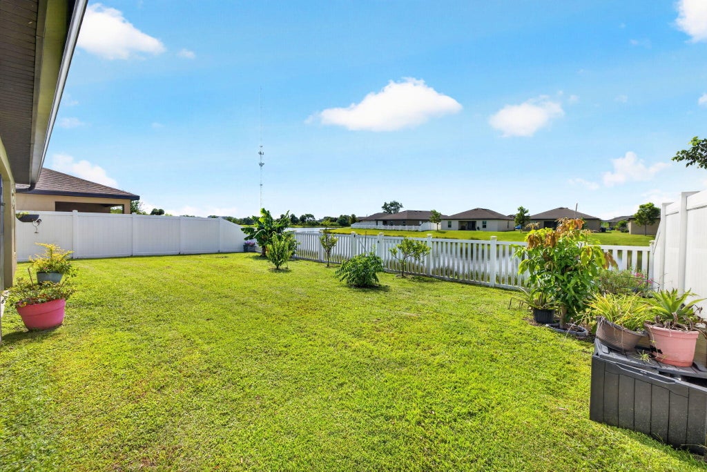 Photo of 5521 Fantasy Drive, Fort Pierce, FL 34947 (MLS # B26055797)
