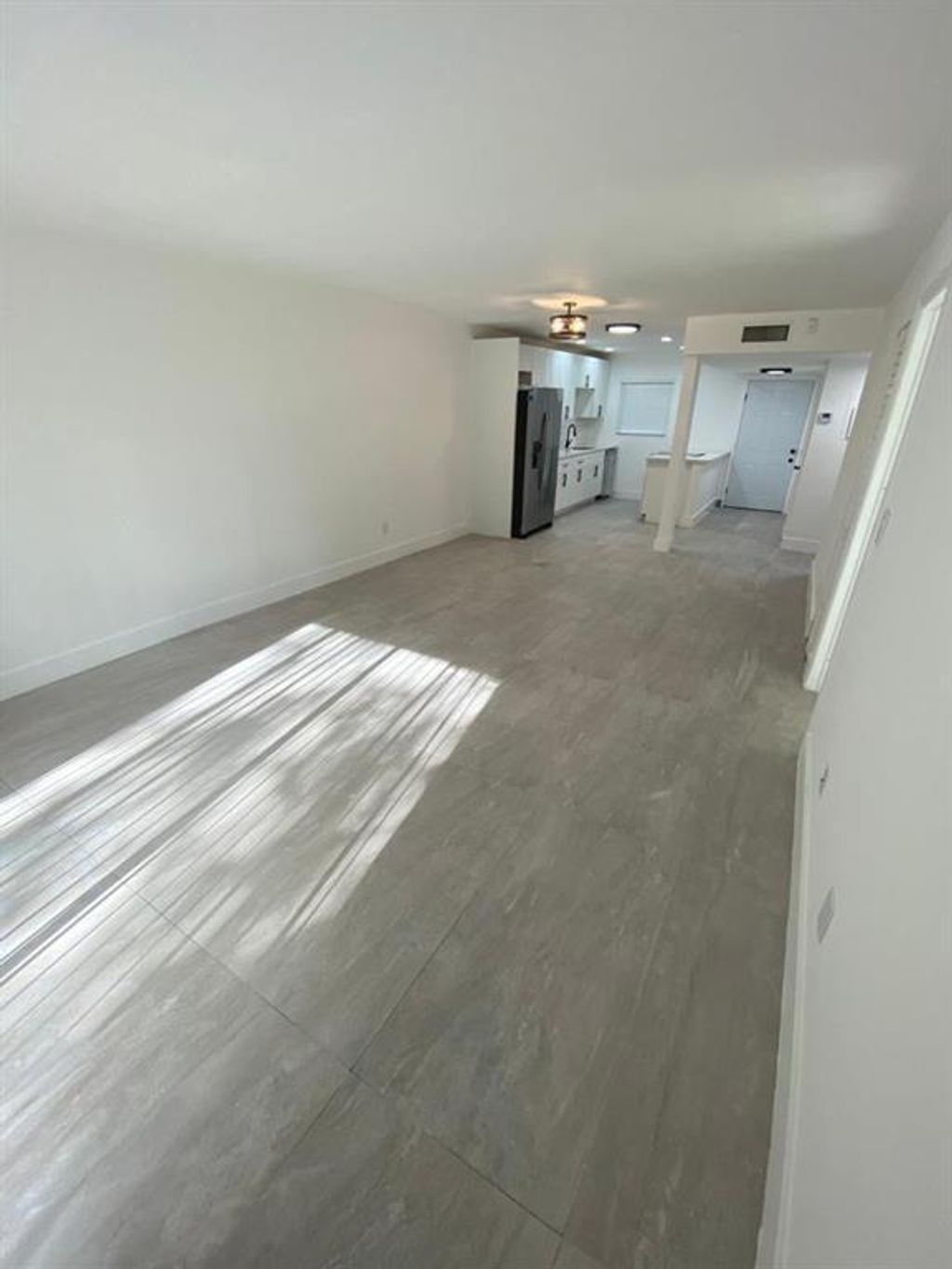 Photo of 4111 Stirling Road #202, Dania Beach, FL 33314 (MLS # B26019075)