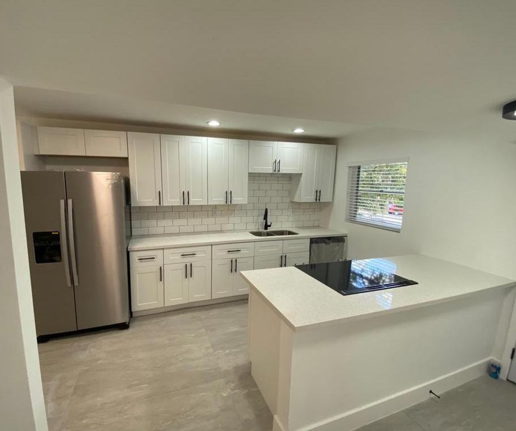 Photo of 4111 Stirling Road #202, Dania Beach, FL 33314 (MLS # B26019075)