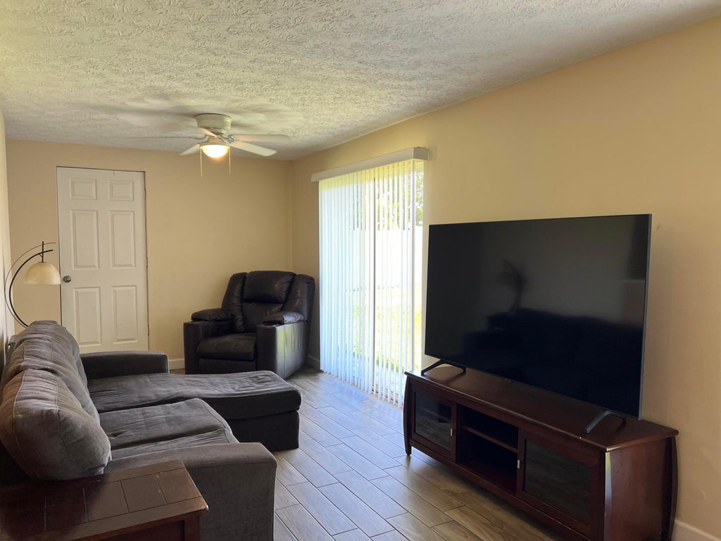 Photo of 432 SW Curry Street, Port Saint Lucie, FL 34983 (MLS # B26044482)