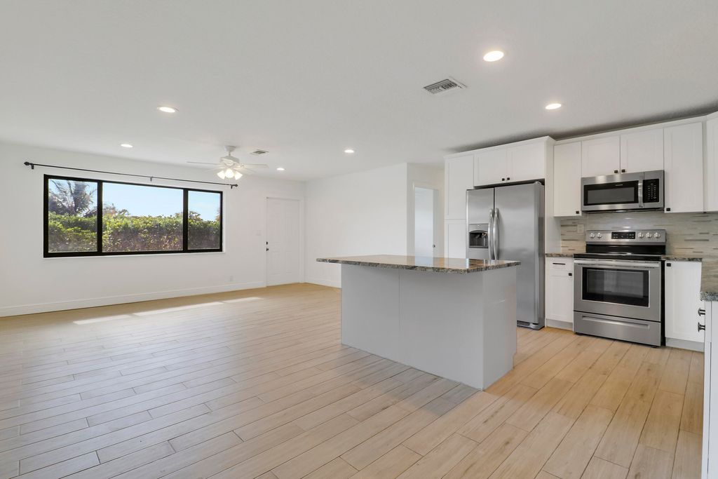 Photo of 816 Juniper Drive, North Palm Beach, FL 33408 (MLS # B26044627)