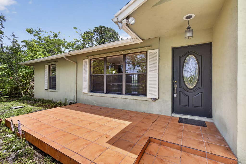 Photo of 11582 60th Street N, West Palm Beach, FL 33411 (MLS # B26036037)