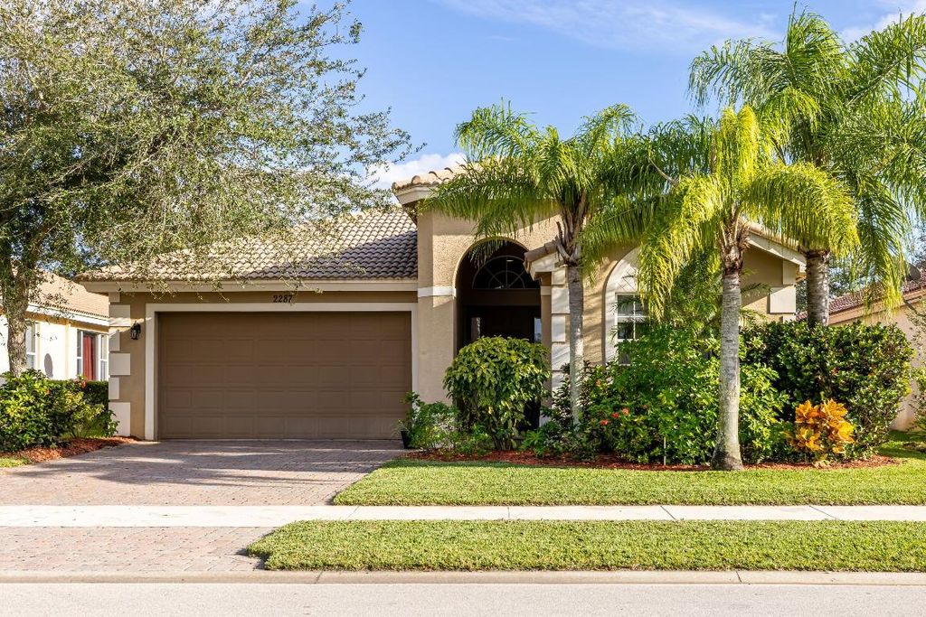 Photo of 2287 SW Newport Isles Boulevard, Port Saint Lucie, FL 34953 (MLS # R10940718)