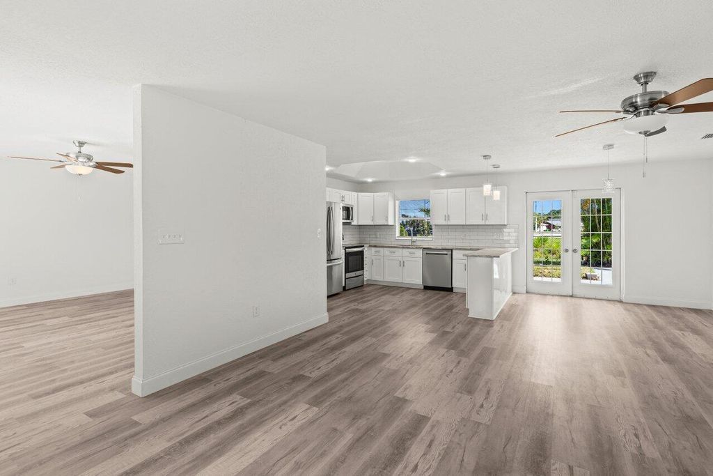 Photo of 798 SE Atlantus Avenue, Port Saint Lucie, FL 34983 (MLS # R11095714)