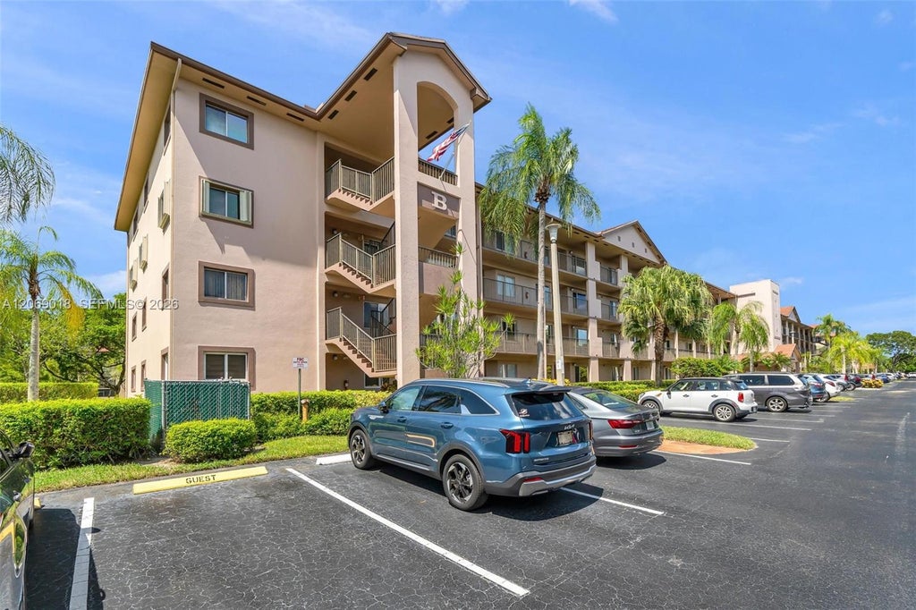 Photo of 12651 SW 16th Court #304B, Pembroke Pines, FL 33027 (MLS # A12069018)