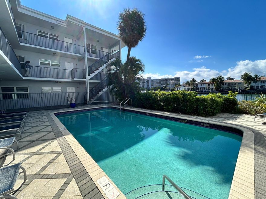 WATERFRONT 1/1 corner unit on the Intracoastal in Hollywood Beach! STEPS from the BEACH , this FIRST FLOOR  condo features an open kitchen and plenty of natural light. Located in a well-maintained , small  boutique building with a community POOL , FITNESS CENTER, community laundry and a BBQ area. Enjoy the best of Florida living - relax by the water, walk to the beach, and be close to dining, shopping and entertainment . Perfect for a true Florida living!  NO MINIMUM CREDIT SCORE