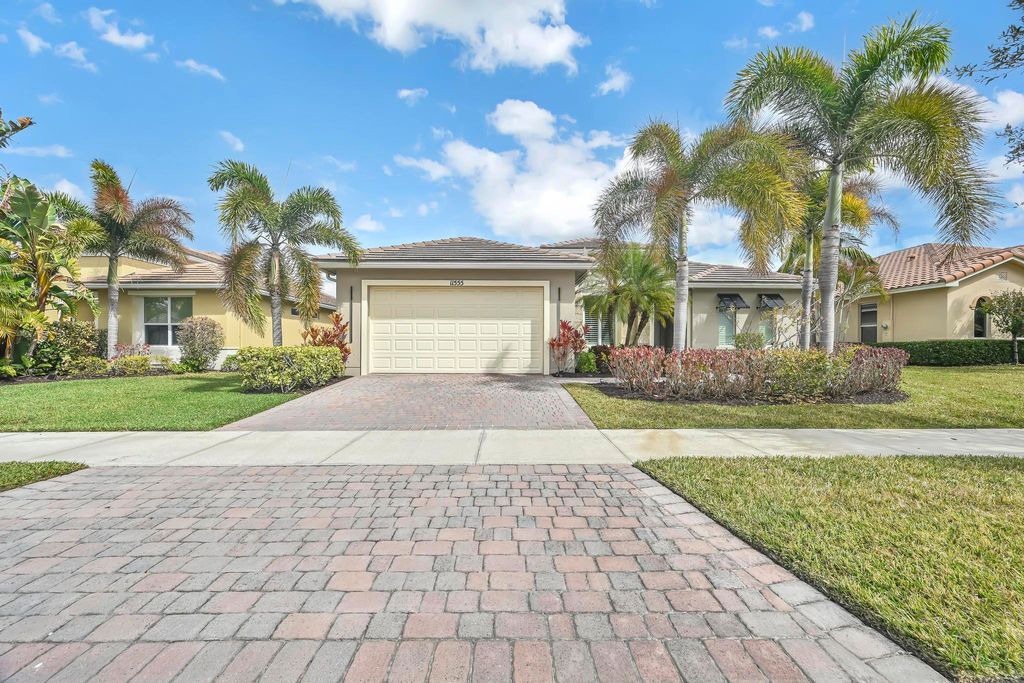 Photo of 11555 SW Apple Blossom Trail, Port Saint Lucie, FL 34987 (MLS # B26017572)