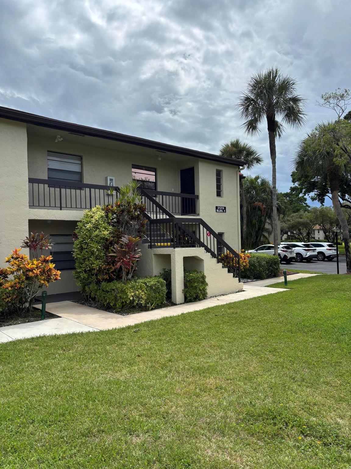 Upstairs corner for sale in very desirable 55+ community of Fairways of Boca Lago. Condo boasts upgraded kitchen open to the living area. Newer cabinets and stainless steel appliances completes the modern look. White tile throughout the body of the unit and carpet in bedrooms. Master bath has an newer walk in shower and newer white vanity.Guest bath also has a walk in shower.Enjoy beautiful views from your back patio which is facing a peaceful view of the lake and golf course. Lots of closet space throughout the unit. HOA includes your internet and cable.