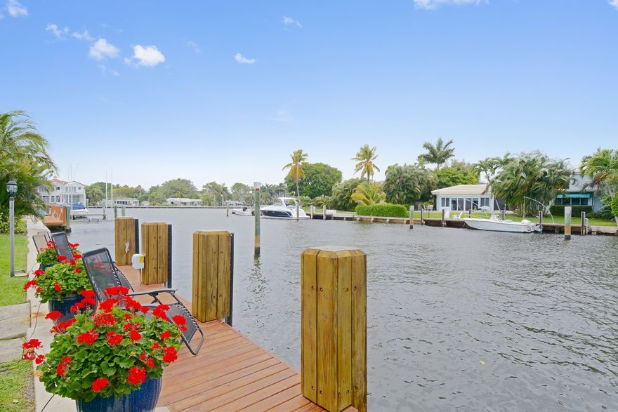 Just a few short blocks to Atlantic Avenue and sited on 100' of waterfrontage, this lovingly maintained home offers a carefree beach lifestyle.  Features include over 4,000 TSF, four oversized bedrooms and  four+ bathrooms, large living/dining room with water views, private den, marble countertops in kitchen, wine cooler, built in refrigerator, separate breakfast area, and spacious laundry room with lots of storage. Impromptu socializing is made easy with the enclosed loggia and pool surrounded by tropical landscaping and wide water with views of the intracoastal.  Bring your boat to dock on 100' feet of deep water. Great value for the beach area.