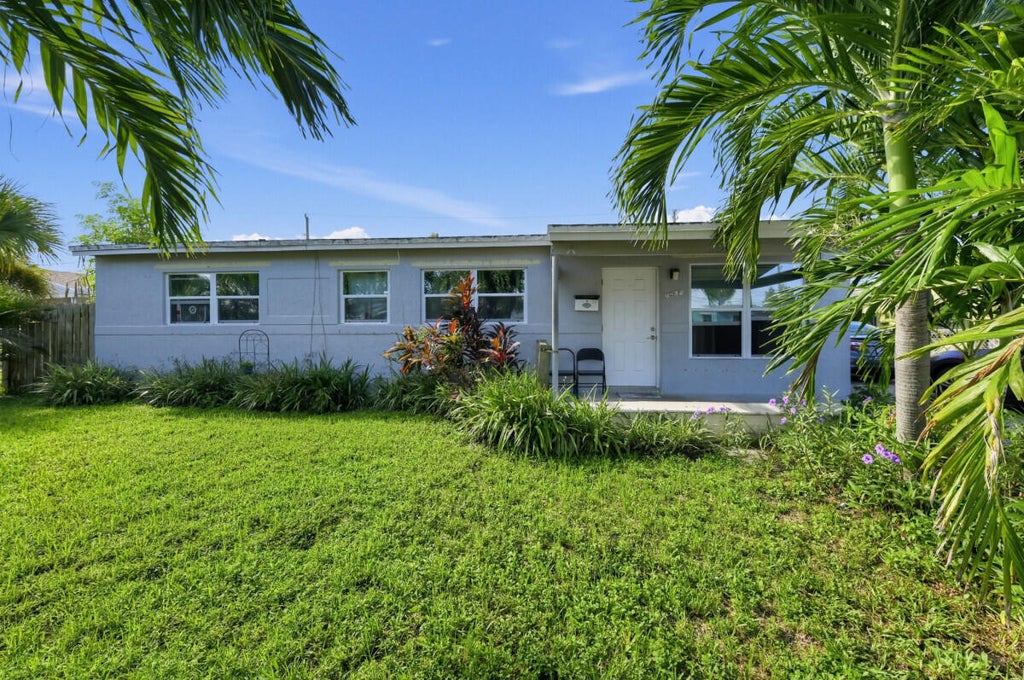 Photo of 1209 W 26th Court, West Palm Beach, FL 33404 (MLS # B26080626)