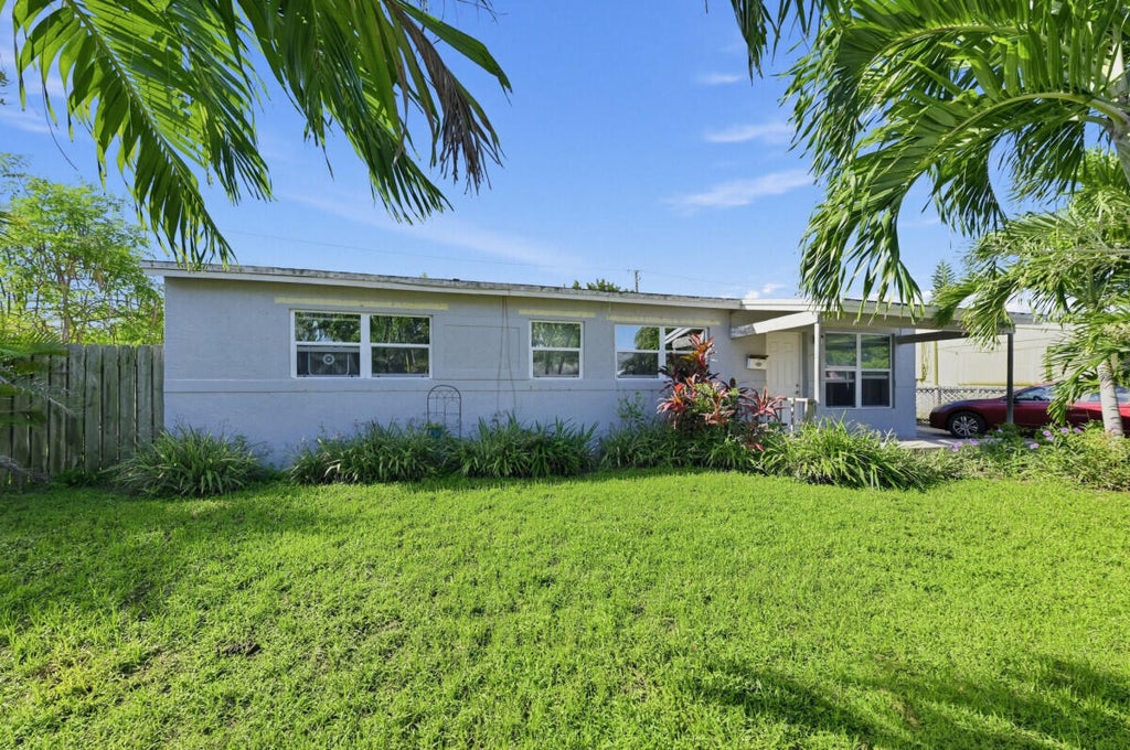 Photo of 1209 W 26th Court, West Palm Beach, FL 33404 (MLS # B26080626)