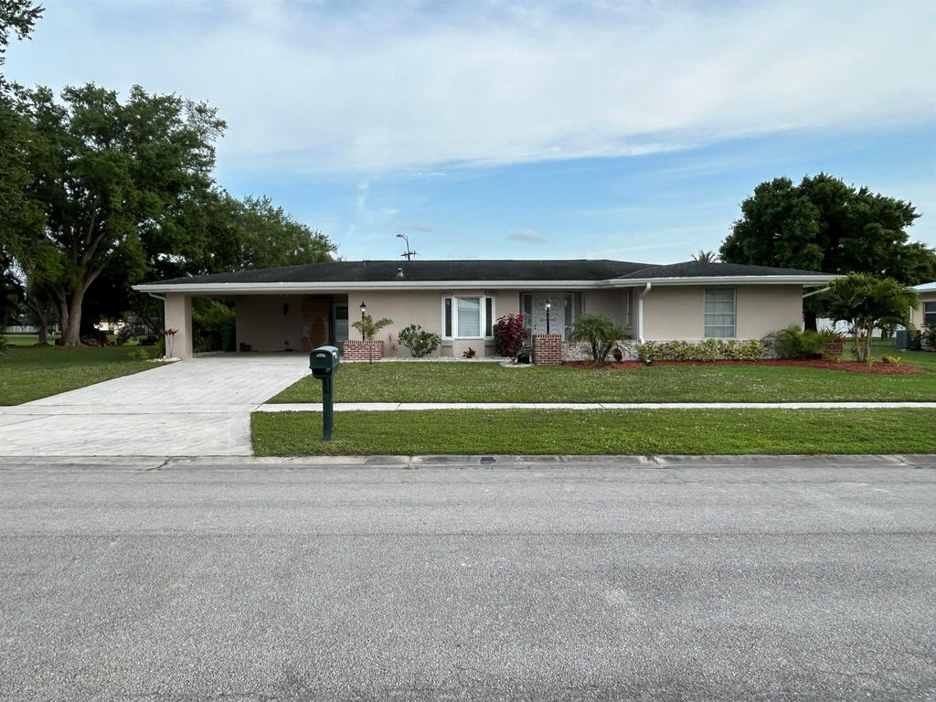 Photo of 3063 SE Santa Anita Street, Port Saint Lucie, FL 34952 (MLS # R10974638)
