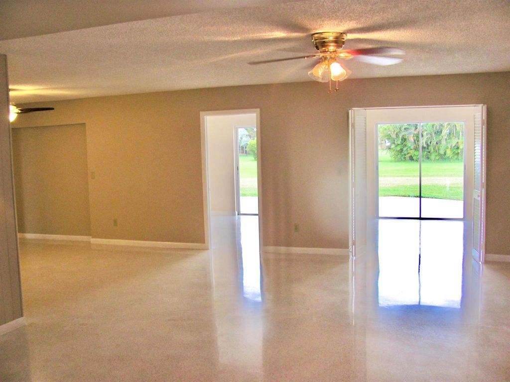 Photo of 3063 SE Santa Anita Street, Port Saint Lucie, FL 34952 (MLS # R10974638)