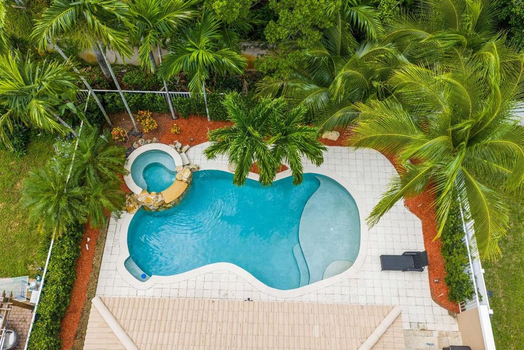 Photo of 5517 Mainship Drive, Greenacres, FL 33463 (MLS # R11134009)