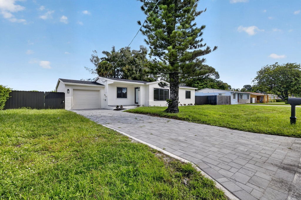 Photo of 3185 Riddle Road, West Palm Beach, FL 33406 (MLS # B26075727)