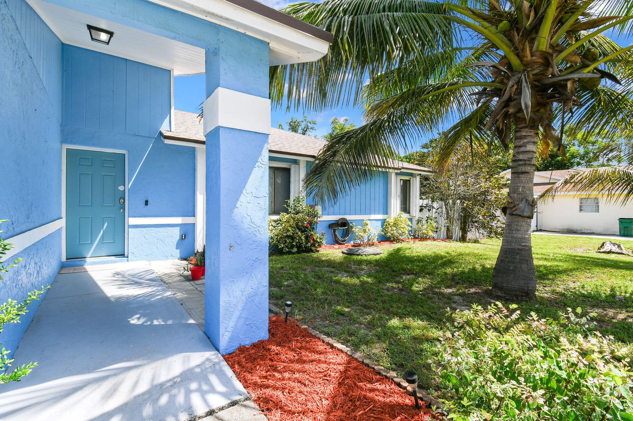 Beautifully updated 3BR/2BA home in a quiet, No-HOA neighborhood! This move-in-ready gem features an open layout, vaulted ceilings, tile flooring, and split-bedroom design. The kitchen offers granite counters, stainless steel appliances, and a breakfast bar. A sliding barn door adds charm to the master suite, leading to a refreshed bath with new shower. Enjoy a fully fenced 10,000 sq ft lot with room for a pool, garden, or play area, plus 2 avocado trees, a coconut tree, and covered patio. Updates: 2018 main roof, 2024 patio roof with silicone seal, 2024 A/C, 2021 water heater, and fresh interior/exterior paint. The 2-car garage includes laundry with washer, dryer, and sink. Convenient to Crosstown Pkwy, US-1, I-95, shopping, schools, and more.