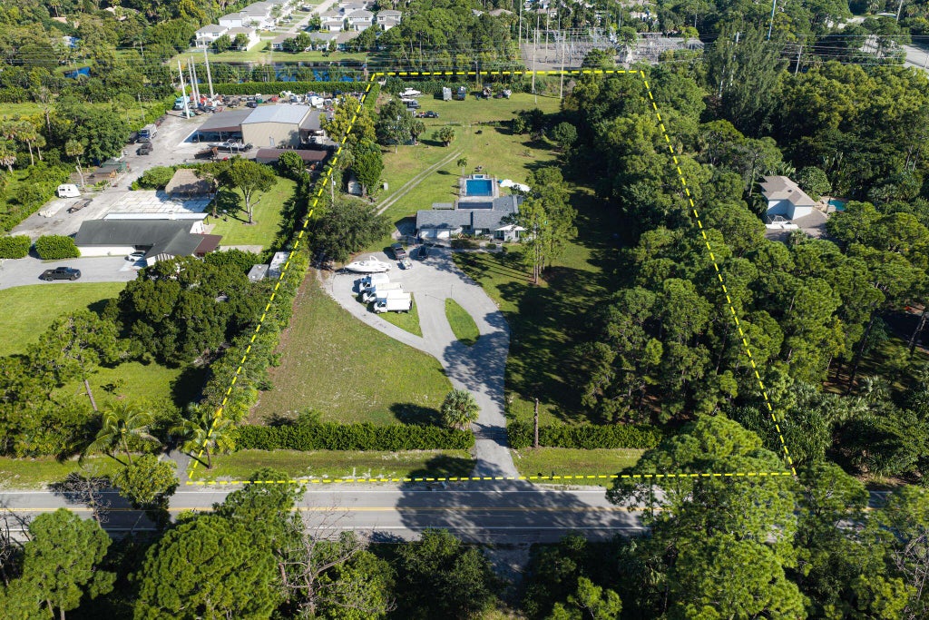 Photo of 6529 Pioneer Road, West Palm Beach, FL 33413 (MLS # B26092710)