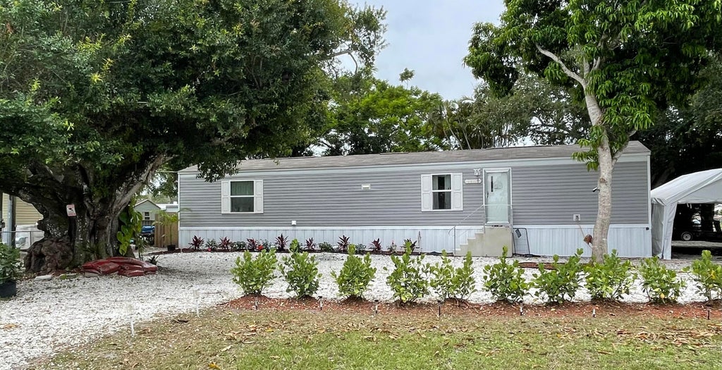 Photo of 4911 Deanna Lane, Fort Pierce, FL 34946 (MLS # B26046125)