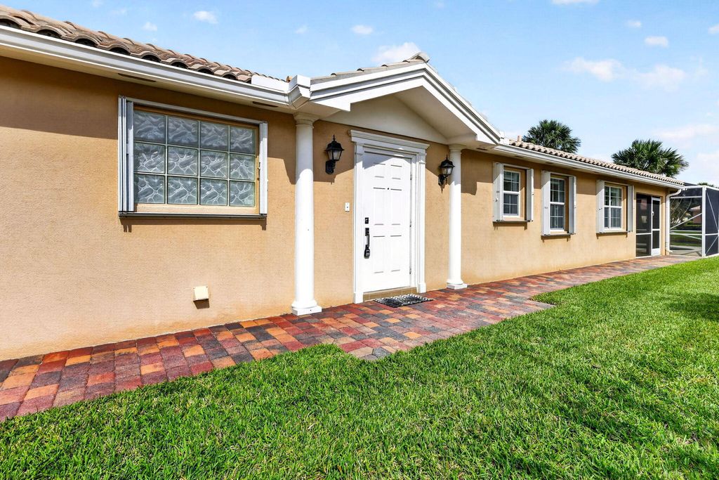 Photo of 11439 SW Pembroke Drive, Port Saint Lucie, FL 34987 (MLS # B26019841)
