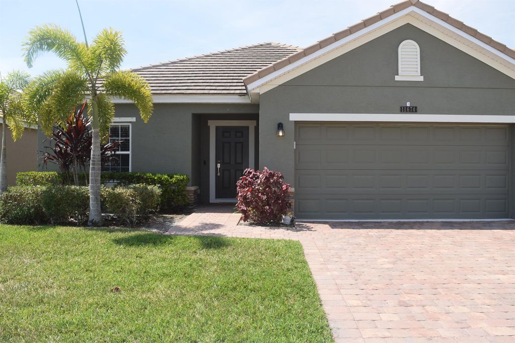 Photo of 11674 SW Rowena Street, Port Saint Lucie, FL 34987 (MLS # R11015319)