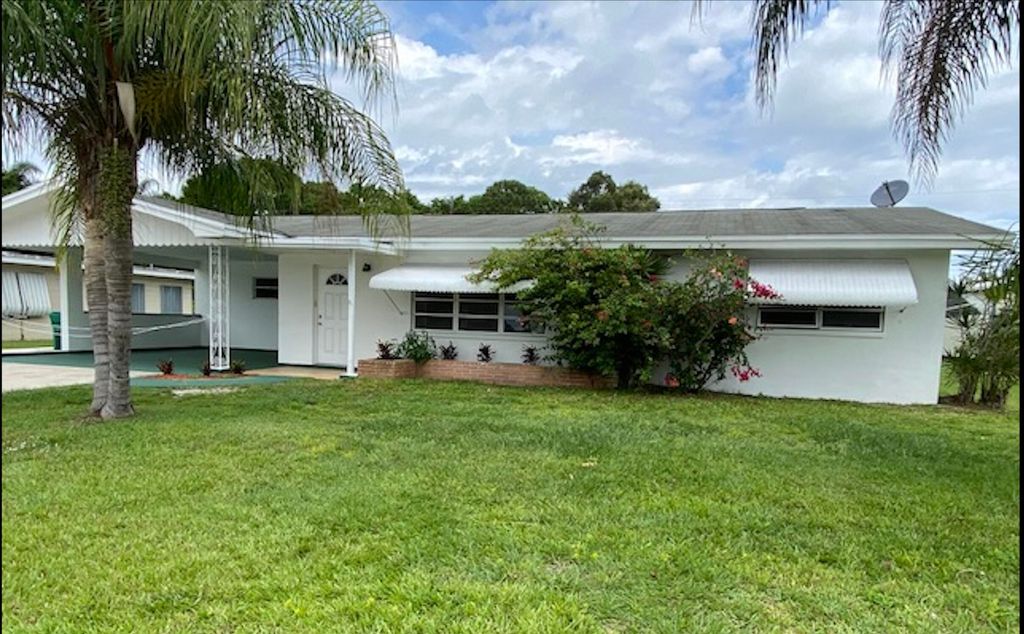 Photo of 771 E Prima Vista Boulevard, Port Saint Lucie, FL 34952 (MLS # R10789307)