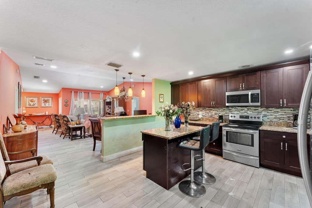 Photo of 5636 Priscilla Lane, Lake Worth, FL 33463 (MLS # B26049235)