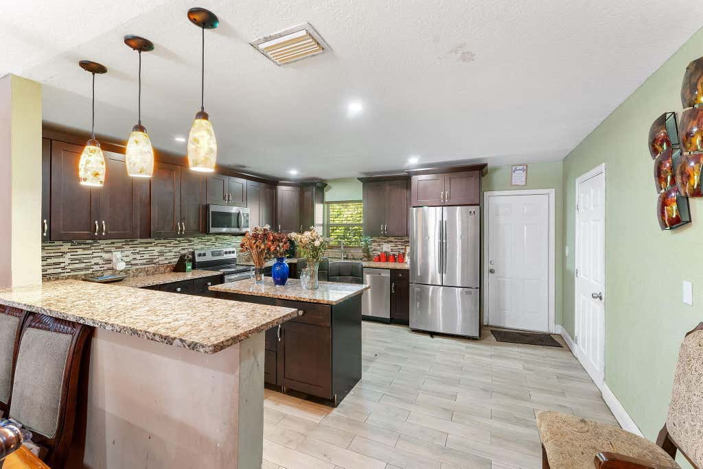 Photo of 5636 Priscilla Lane, Lake Worth, FL 33463 (MLS # B26049235)