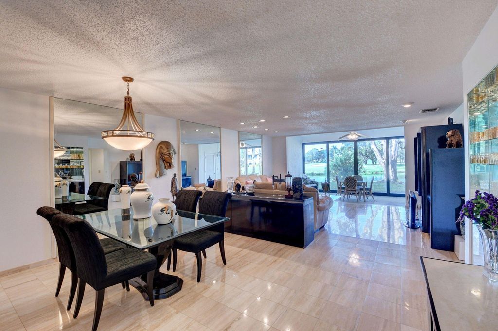 Photo of 61 Eastgate Drive #E, Boynton Beach, FL 33436 (MLS # R10954447)