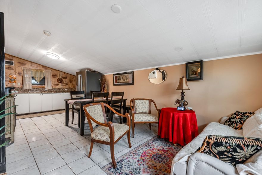 Full of potential, this 3-bedroom, 2-bathroom single-family home offers a fantastic opportunity to create your dream space—with NO HOA restrictions. Ideally located in the heart of Hypoluxo, this property features tile flooring throughout, providing a solid and low-maintenance foundation.  The home is ready for a new owner to add their personal touch and complete the finishing details, making it perfect for buyers looking to customize or invest. Enjoy a functional layout, ample natural light, and a spacious yard with room to enhance outdoor living or entertaining areas.  Conveniently situated near major roadways, shopping, dining, and just a short drive to beautiful South Florida beaches, this property combines location, value, and endless potential.