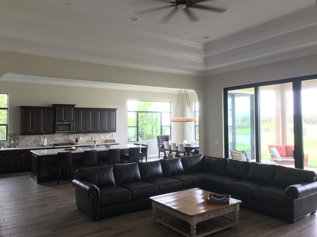Photo of 9387 Grand Prix Lane, Boynton Beach, FL 33472 (MLS # B26024381)