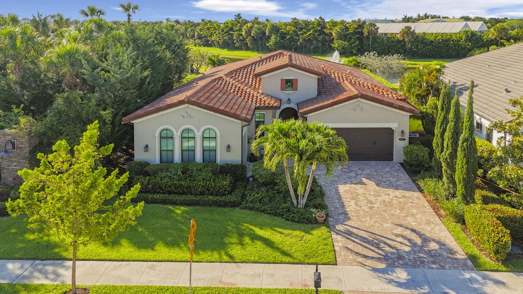 Photo of 9387 Grand Prix Lane, Boynton Beach, FL 33472 (MLS # B26024381)