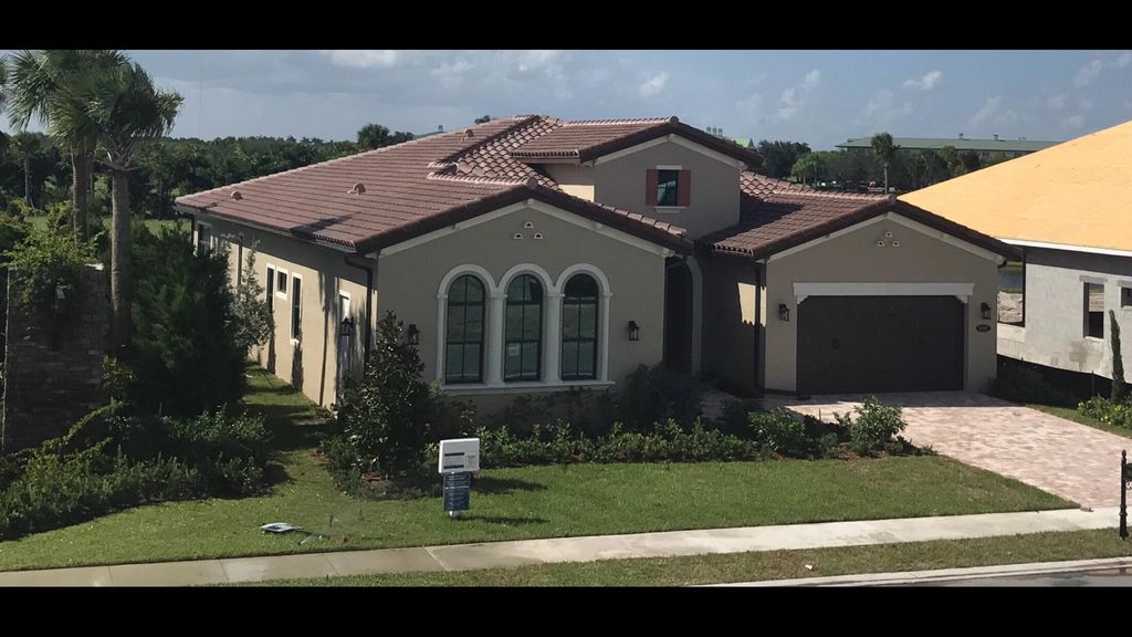 Photo of 9387 Grand Prix Lane, Boynton Beach, FL 33472 (MLS # B26024381)