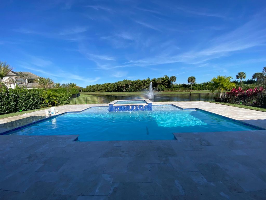 Photo of 9387 Grand Prix Lane, Boynton Beach, FL 33472 (MLS # B26024381)