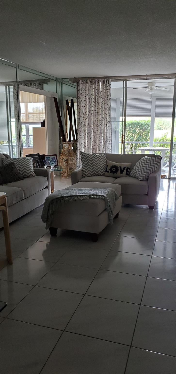Photo of 2671 S Course Drive #108, Pompano Beach, FL 33069 (MLS # B26043652)