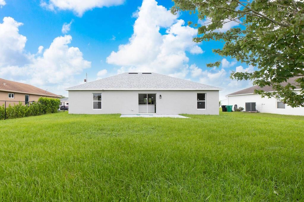 Photo of 1520 SW Hackensack Avenue, Port Saint Lucie, FL 34953 (MLS # R11009119)