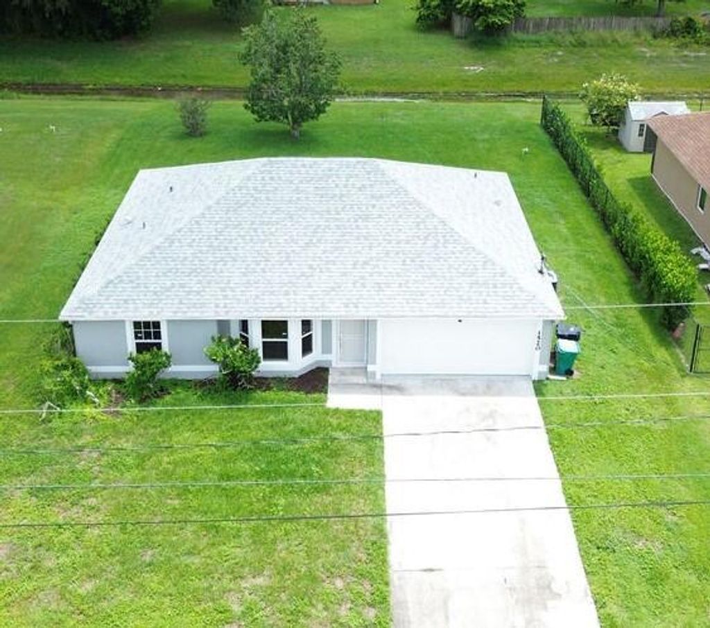 Photo of 1520 SW Hackensack Avenue, Port Saint Lucie, FL 34953 (MLS # R11009119)