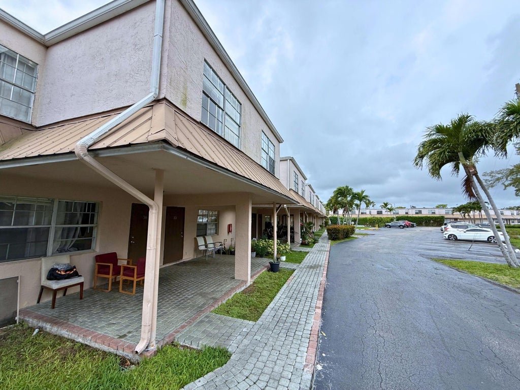 Photo of 4100 NW 16th Avenue #31, Oakland Park, FL 33309 (MLS # B26032848)