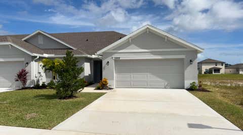 Photo of 8602 GIOVANNI Avenue, Fort Pierce, FL 34951 (MLS # B26061628)