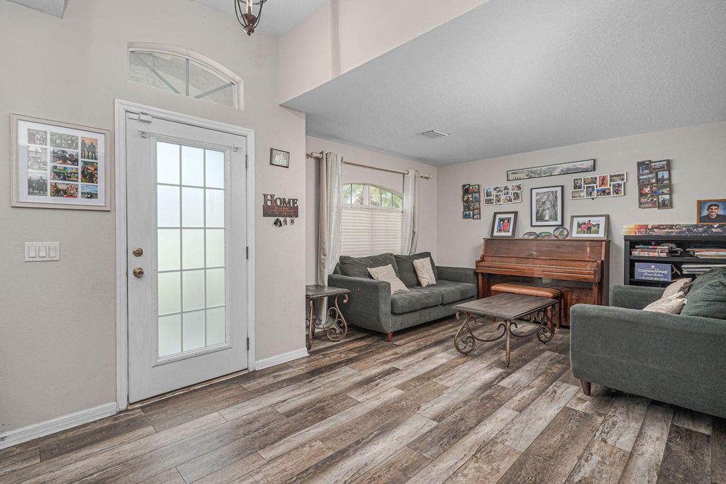 Photo of 1949 SW Logan Street, Port Saint Lucie, FL 34953 (MLS # R11062956)