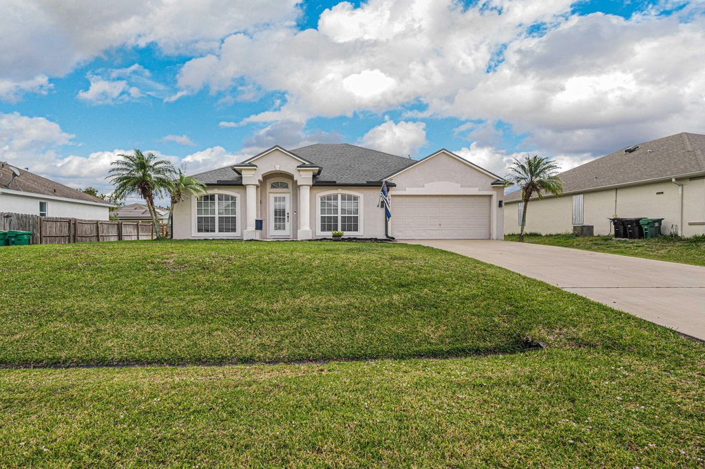Photo of 1949 SW Logan Street, Port Saint Lucie, FL 34953 (MLS # R11062956)