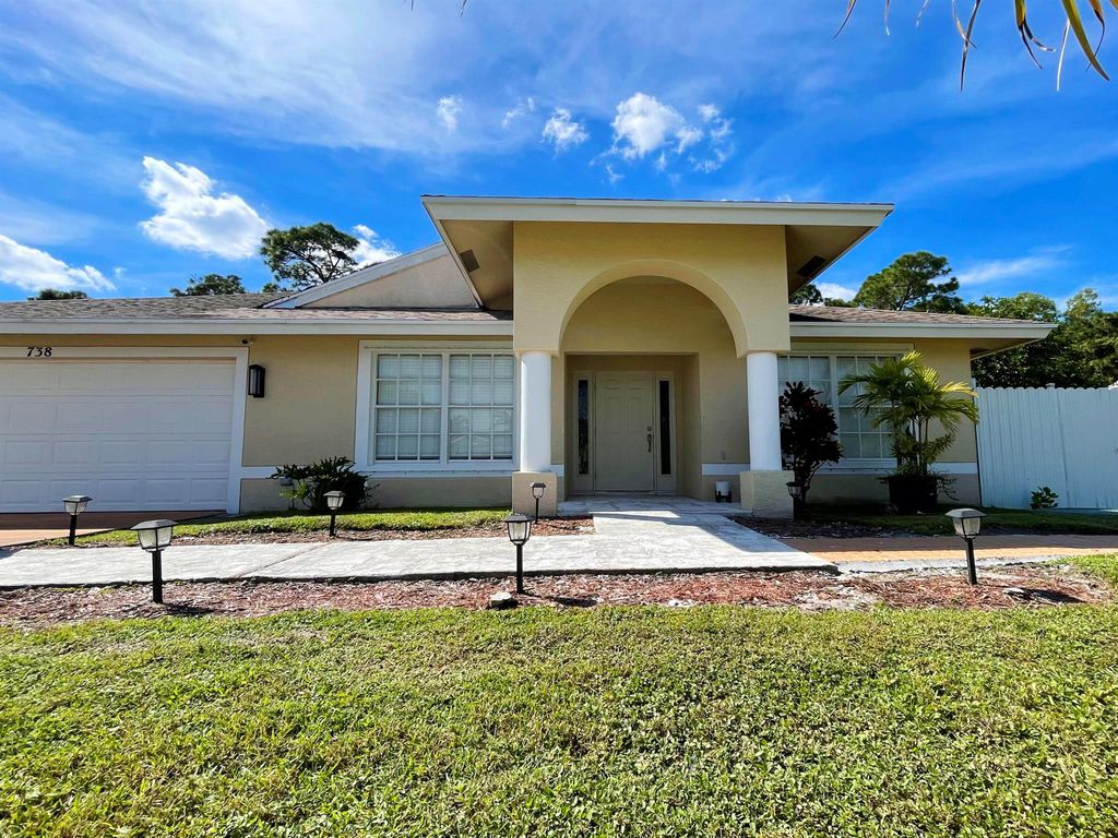 Photo of 738 NE Galilean Street, Port St Lucie, FL 34983 (MLS # R10930102)