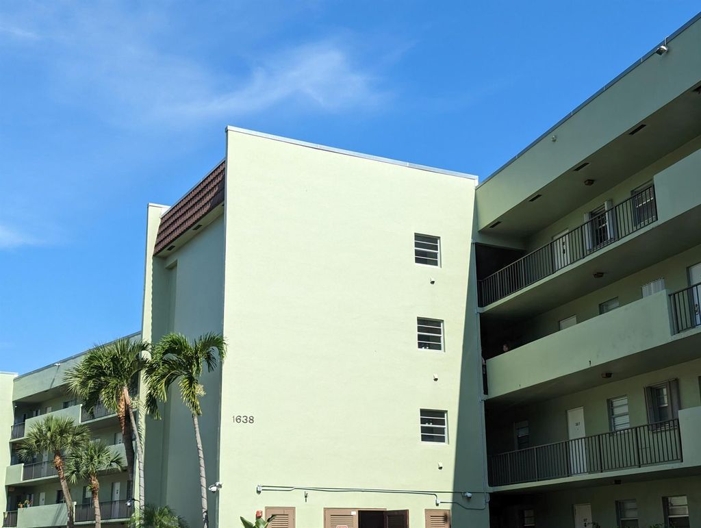 Photo of 1638 Embassy Drive #302, West Palm Beach, FL 33401 (MLS # R11102731)