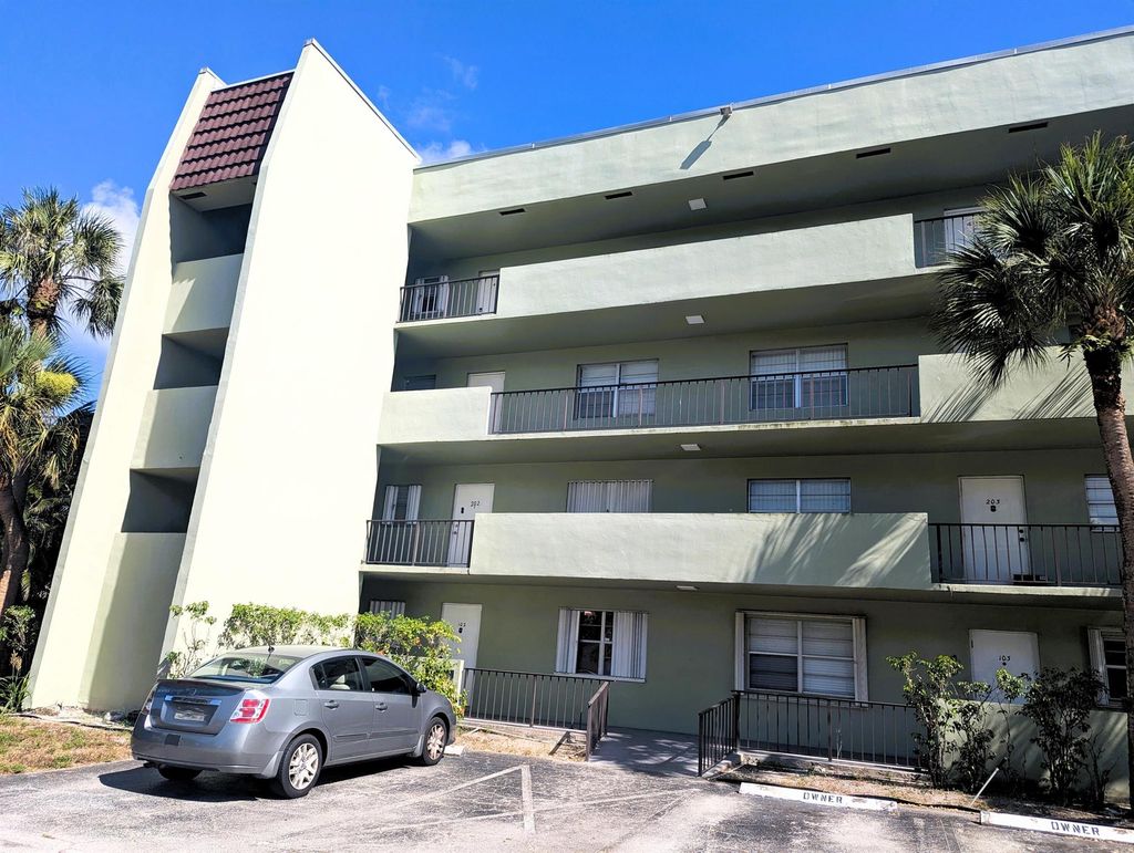 Photo of 1638 Embassy Drive #302, West Palm Beach, FL 33401 (MLS # R11102731)