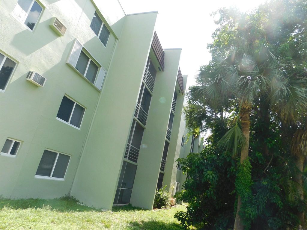 Photo of 1638 Embassy Drive #302, West Palm Beach, FL 33401 (MLS # R11102731)