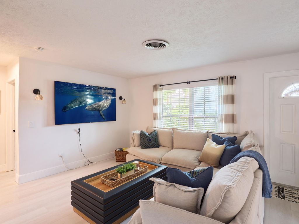 Photo of 3743 NE Barbara Drive, Jensen Beach, FL 34957 (MLS # B26042238)