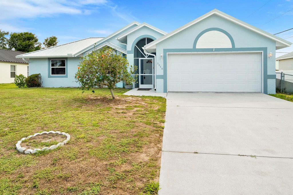 Photo of 3048 SE Wake Road, Port Saint Lucie, FL 34984 (MLS # R11095091)
