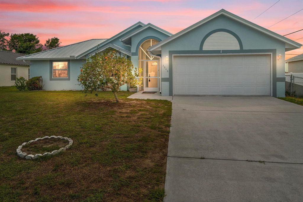 Photo of 3048 SE Wake Road, Port Saint Lucie, FL 34984 (MLS # R11095091)