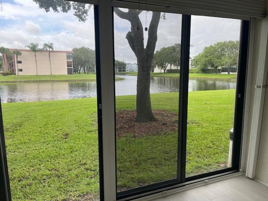 Photo of 15324 Lakes Of Delray Boulevard #104, Delray Beach, FL 33484 (MLS # R10996856)