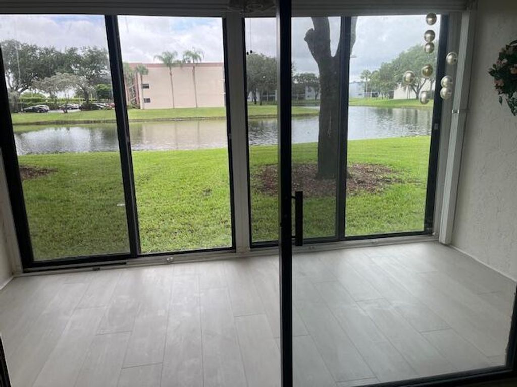 Photo of 15324 Lakes Of Delray Boulevard #104, Delray Beach, FL 33484 (MLS # R10996856)